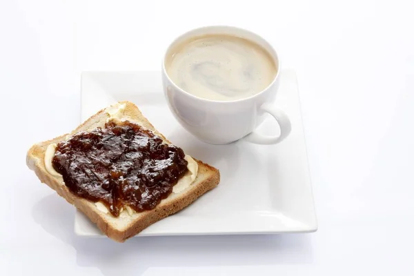 Porzellanteller Mit Einer Tasse Kaffee Und Toast Mit Rhabarbermarmelade — Stockfoto