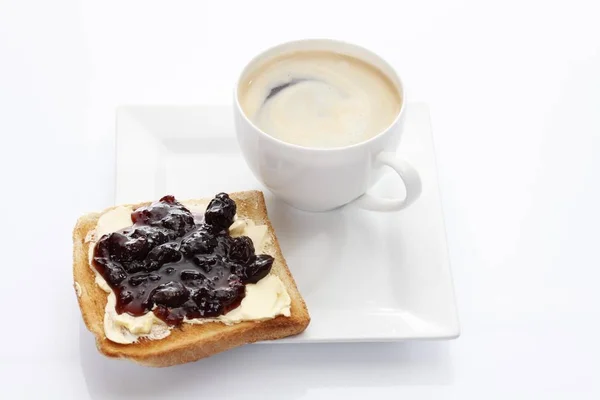 Porzellanteller Mit Einer Tasse Kaffee Und Toast Mit Kirschmarmelade — Stockfoto