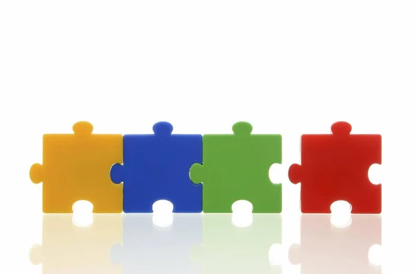 Different Colored Puzzle Pieces — Stock Photo, Image