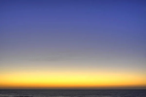 Puesta de sol sobre el mar — Foto de Stock