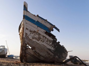 Rotting wooden boat on the beach, Novo Sancti Petri, Andalusia, Spain, Europe clipart