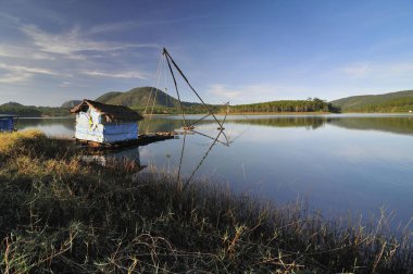 Fisherman's hut on the bank of the Tuyen Lam lake, Dalat, Central Highlands, Vietnam, Asia clipart