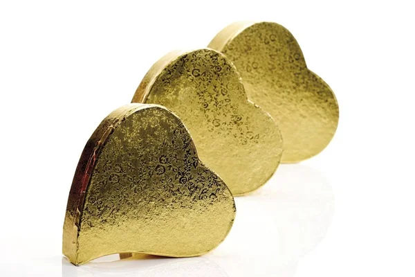 Small Golden Heart Shaped Gift Boxes Stock Picture