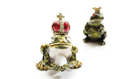 two Frogs figure toys with crowns clipart