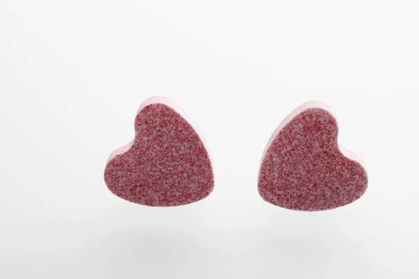 Two Pink Heart Shaped Grape Sugars — Stock Photo, Image