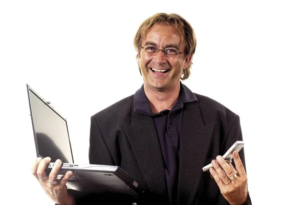 Homem Radiante Com Laptop Telefone Celular Celular Suas Mãos — Fotografia de Stock