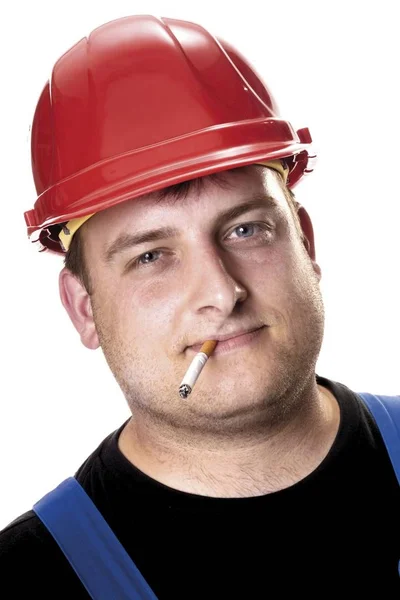 Mecânico Usando Capacete Vermelho Construção Cigarro Sua Boca — Fotografia de Stock