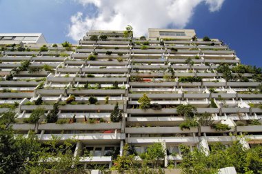 Green concrete balconies Olympiadorf Olympia high-rise flats village Munich clipart