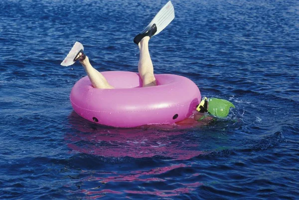 Floating Tire Bathing Flippers Playing Water Sea Lake — Stock Photo, Image