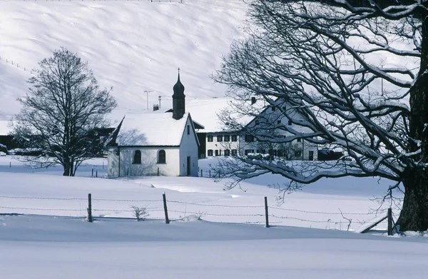 雪の風景のババリア地方の家 — ストック写真