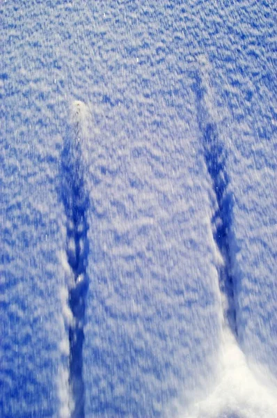 Snö marken med Ski tips — Stockfoto