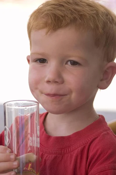 Boy Drinks Out Glas — Stock Photo, Image