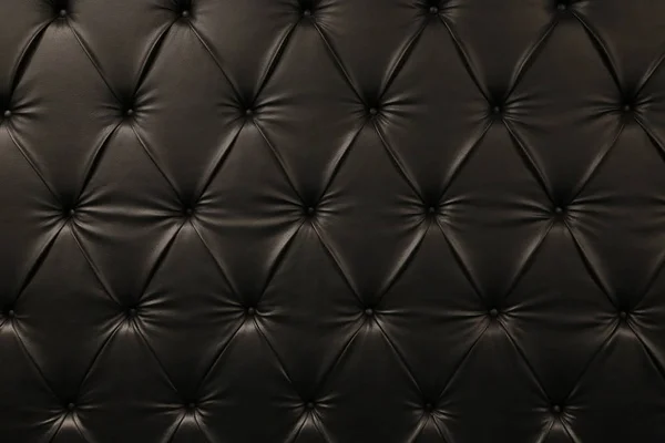 Siyah deri arka plan düğmeleri ile. Lüks desen olarak yararlı