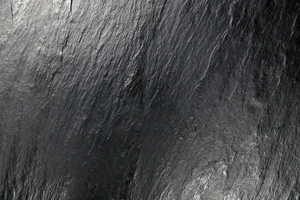 Koyu gri, siyah taş. Rock doku. 