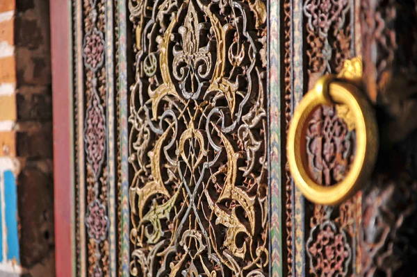 Old wooden doors with arabic pattern