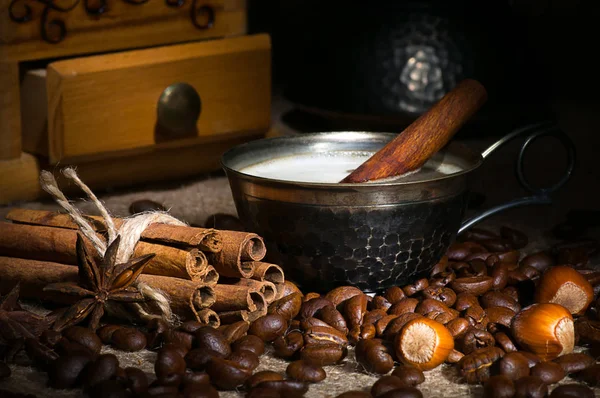 Coffee in vintage cup served with spices — Stock Photo, Image