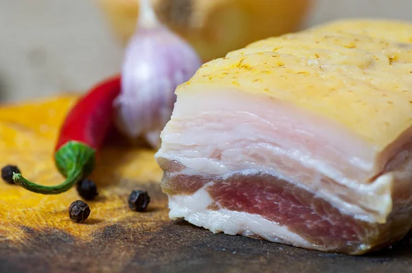 Salted Fatback (streak of lean) on cutting board — Stock Photo, Image