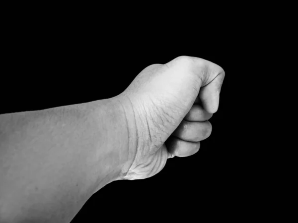 Clenched Fist Hand Gesture, Isolated On Black Background