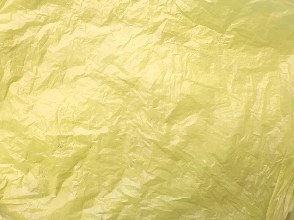 Sac Plastique Jaune Froissé Fond Texturé Abstrait — Photo