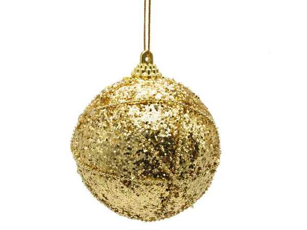 Christmas and New Year`s ball of yellow shiny color on a white b — Φωτογραφία Αρχείου