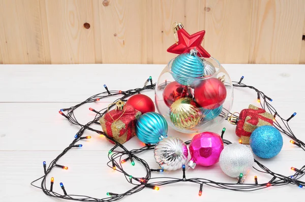 Christmas and New Year's toys in a glass aquarium — Stock Photo, Image