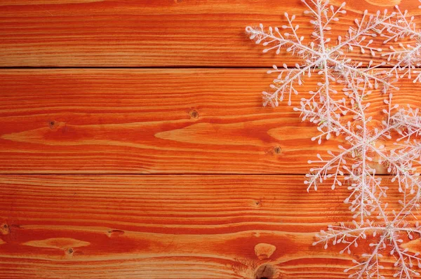 Bolas de nieve sobre un fondo de madera —  Fotos de Stock