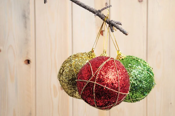 Christmas and New Year's toys on a wooden background — Stock Photo, Image