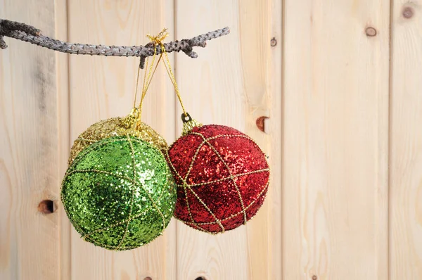 Christmas and New Year's toys on a wooden background — Stock Photo, Image