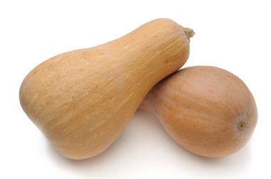 İzole edilmiş beyaz arka planda turuncu, olgun balkabağı.