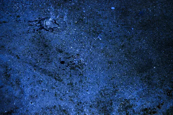 Water Plas Druppels Licht Cirkels Het Blauw — Stockfoto