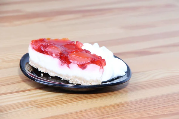 Şeker ile plaka üzerinde Cheesecake 