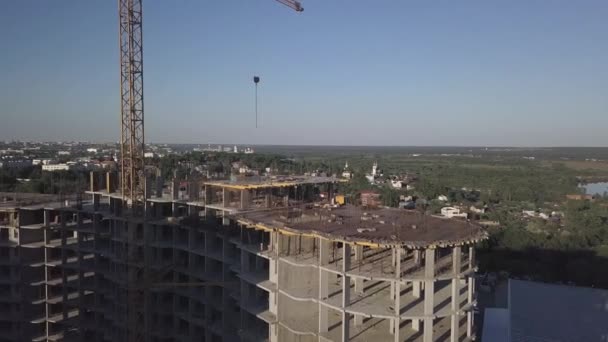 Aerial view of building cranes and buildings under construction — Stock Video