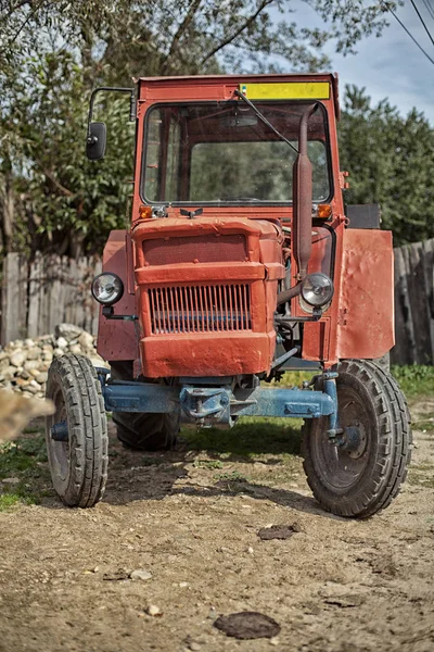 Old vintage traktor in Romania village road — Stock Photo, Image