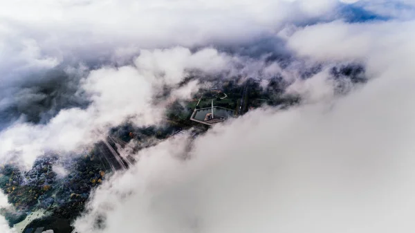 Riga city Autumn Drone flight above and clouds monument — Stock Photo, Image