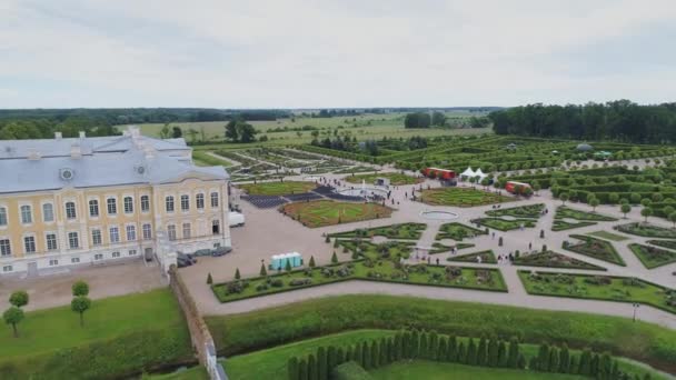 Castle park Rundale in Latvia drone flight above trees, summer time — Stock Video