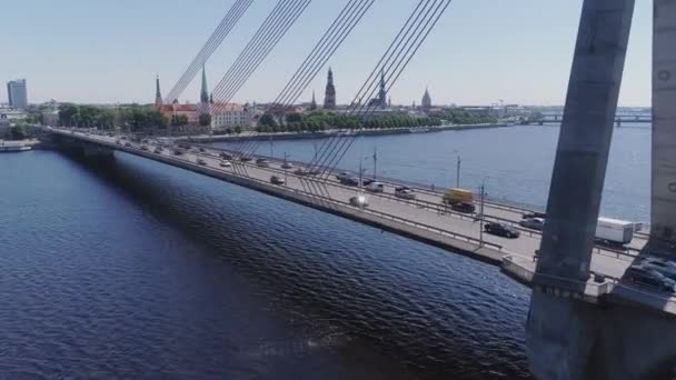 Latvia Daugava River city, cityscape, bridge, architecture, drone, motion, timelapse, aerial — стоковое видео