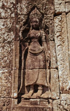 Agkor Wat tapınağının duvarlarında Kamboçya duvarları ve mağara resimleri var.