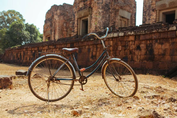 Classic vintage Bicycle in Angkor Wat temple Cambodia