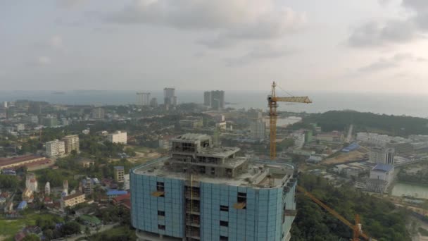 Construction Crane and building process in Cambodia Sihanoukville city — Stock Video