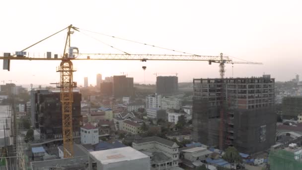 Construction Crane and building process in Cambodia Sihanoukville city — Stock Video