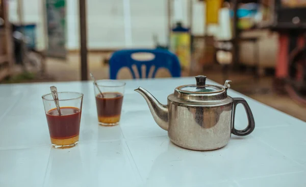 Thai Tea with milk and teapot on the table — Stock Photo, Image