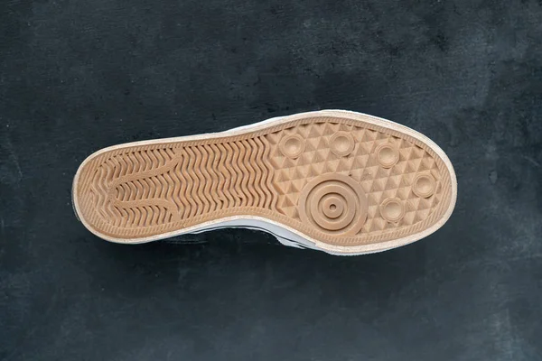 dirty and dusty used sneaker shoe sole, the bottom part