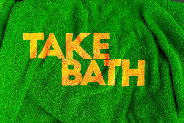 Текстовое слово для ванны на текстуре полотенца, концепция чистого СПА ухода за телом — стоковое фото