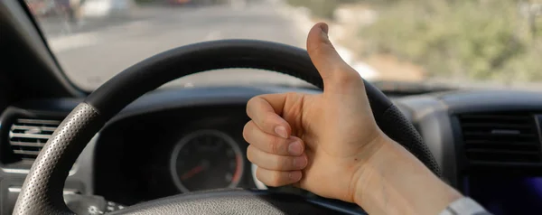 First Person View Driver Showing Thumb Front Steering Wheel — Stock Photo, Image