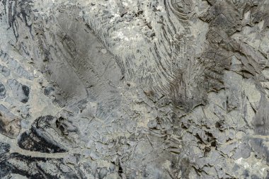 Toprak, toz ve çiziklerle dolu grunge yüzeyi, gri renkli arka plan vuruşları