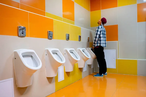 Young Man Public Toilet Standing Next Urinal Trade Center — Stock Photo, Image