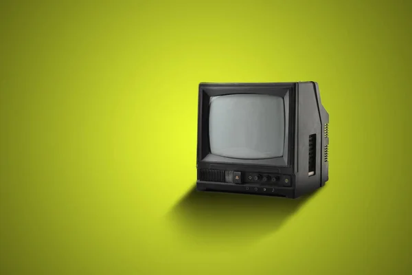 Old vintage simple tv isolated on color background, minimalist concept of old fashion — 图库照片