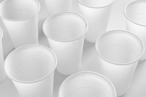 A fastfood white plastic cups, empty abstract plastic dishware — 스톡 사진