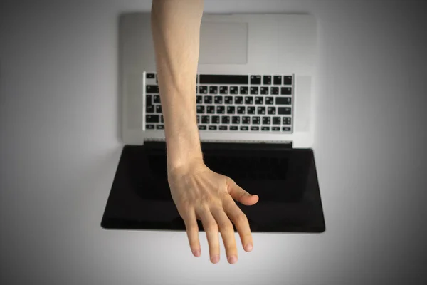 A top view of person hands close cover or block the laptop webcam, being afraid of spy hack the camera — ストック写真