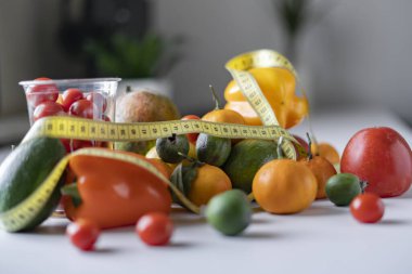 mix of various raw fruit flat lay with a centimeter, the diet concept